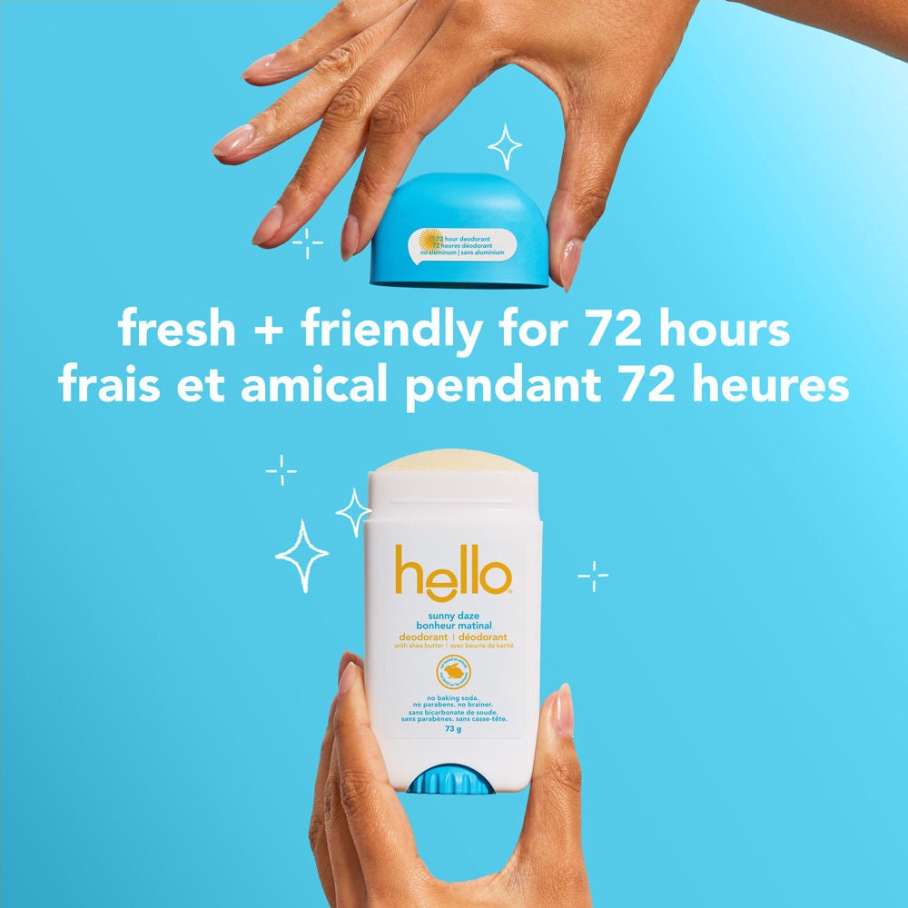 Hands placing the blue cap onto the open Hello Sunny Daze deodorant stick against a solid blue background. Text above reads "fresh + friendly for 72 hours / frais et amical pendant 72 heures"
