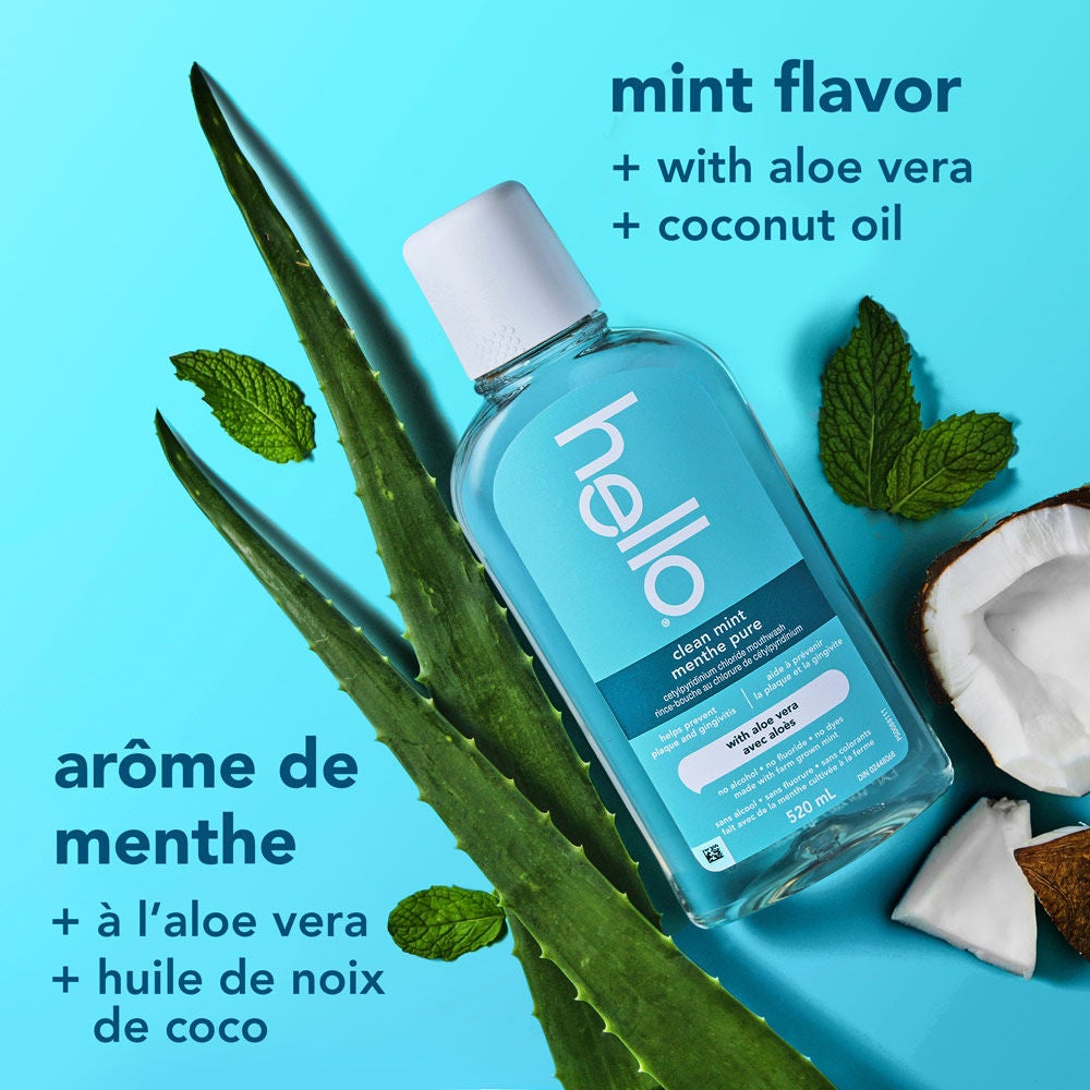 hello Clean Mint Alcohol Free Mouthwash bottle shown with aloe vera, mint leaves, and an open coconut highlighting mint flavour with aloe vera and coconut oil.