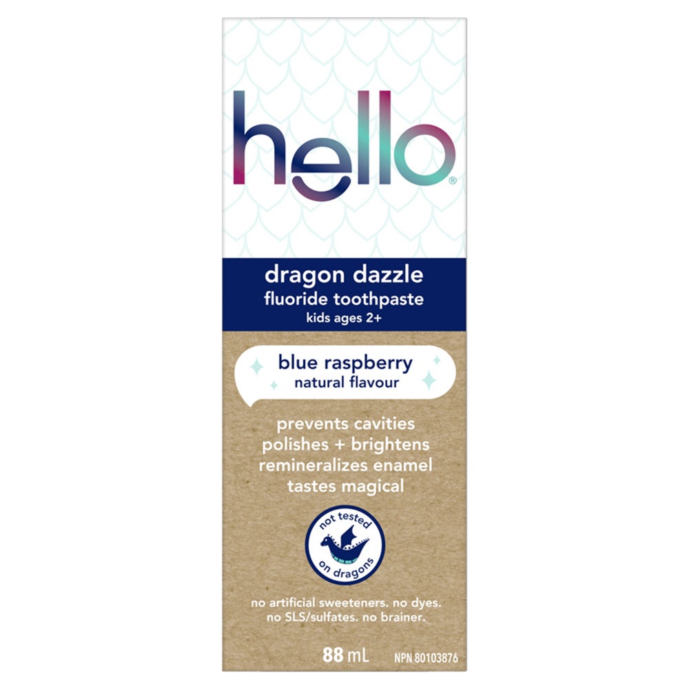 A carton of Hello Dragon Dazzle fluoride toothpaste for kids ages 2+. The carton features a dragon illustration and text that reads &quot;blue raspberry,&quot; &quot;natural flavour,&quot; &quot;prevents cavities polishes + brightens remineralizes enamel,&quot; &quot;tastes magical,&quot; and &quot;not tested on dragons.&quot; It also lists the features &quot;no artificial sweeteners. no dyes. no SLS/sulfates. no brainer&quot; and indicates the size is 88 mL.