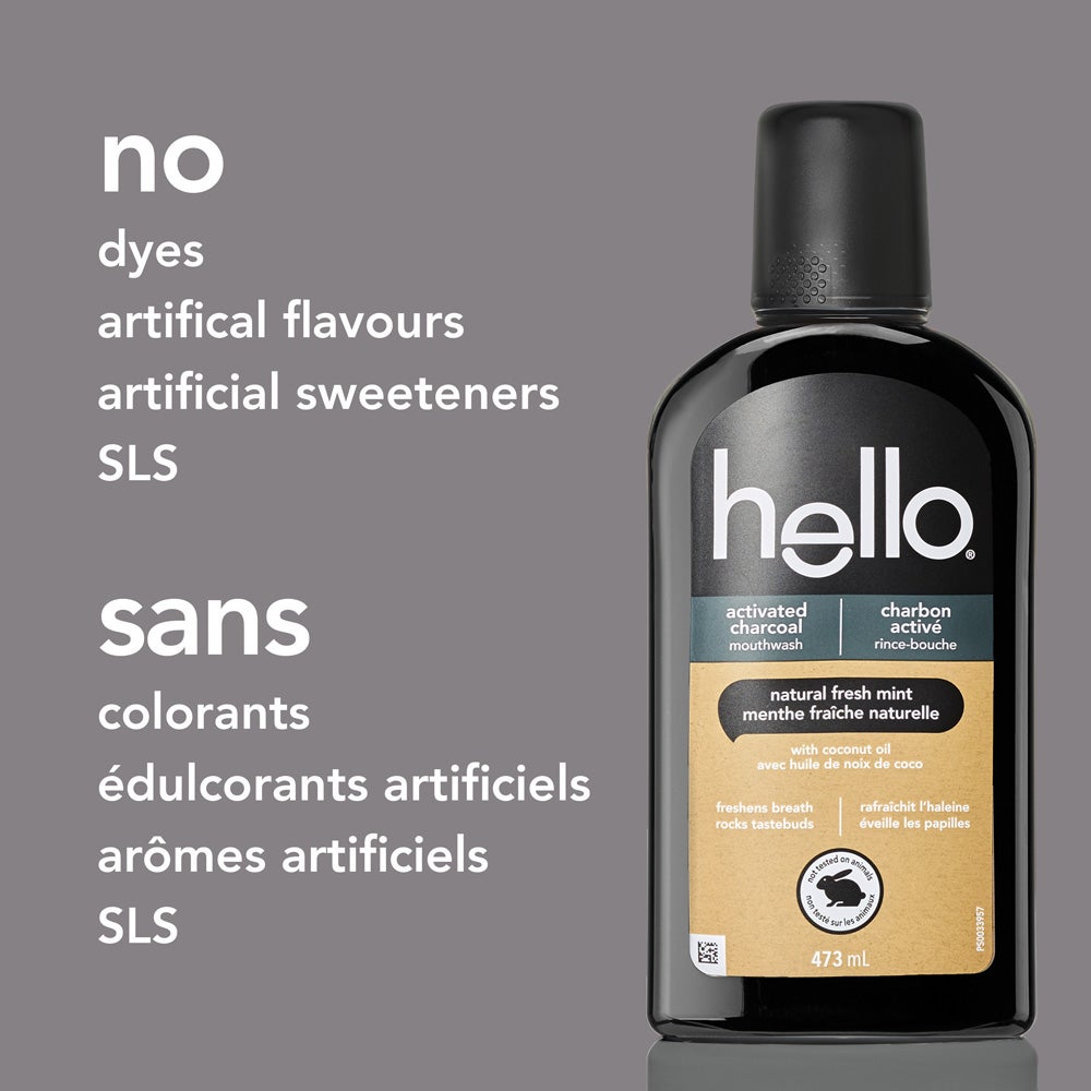 A black bottle of hello activated charcoal mouthwash is centered on a grey background. To the left, white text lists ingredients not in the mouthwash: &quot;no dyes, artificial flavours, artificial sweeteners, SLS.&quot;